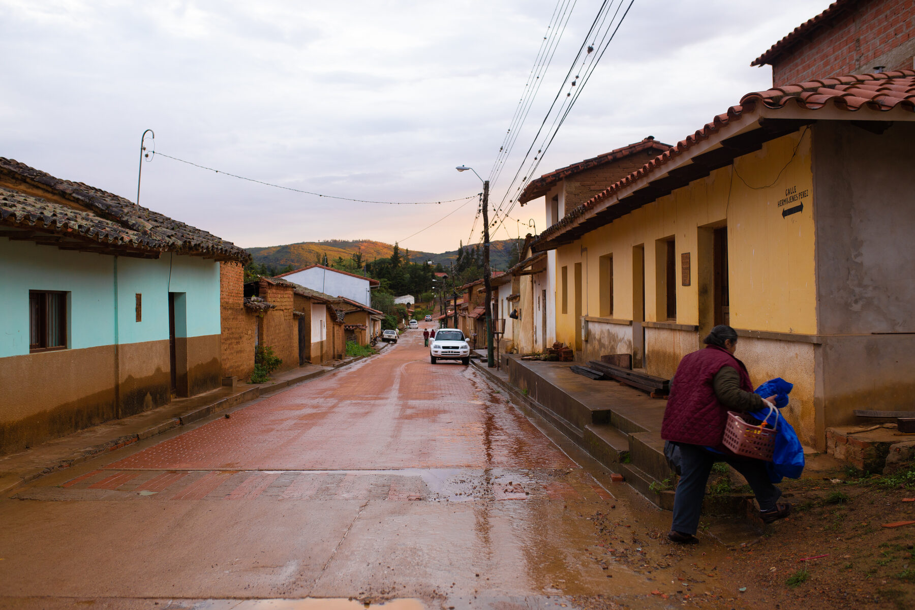 A Samaipata street after rain, low evening light
